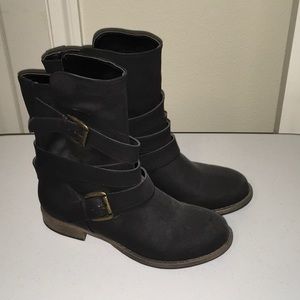 Black ankle boots with buckles